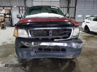 2000 Ford F-150 XL with VIN 1FTZX1720YKB22051, listed as a Copart auction lot 88255005 with 243,759 mi miles and Salvage Title. Bid and sale history available at carsss.com. Image 5.
