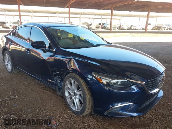 2016 Mazda 6 i Touring with VIN JM1GJ1T5XG1434388, listed as a IAAI auction lot 41528124 with 99,293 mi miles and . Bid and sale history available at DreamBid. Image 6.