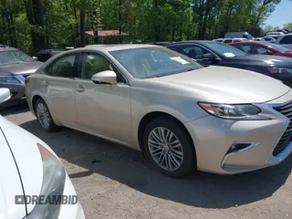2016 Lexus ES with VIN JTHBK1GG3G2223805, listed as a IAAI auction lot 42065504 with 210,363 mi miles. Bid and sale history available at carsss.com. Image 13.