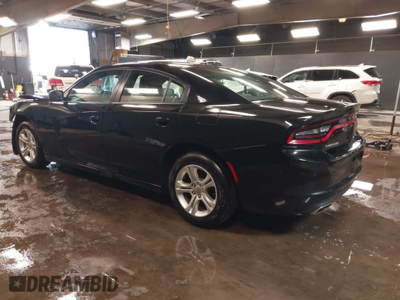 2021 Dodge Charger SXT with VIN 2C3CDXBG8MH541839, listed as a IAAI auction lot 41620879 with 79,889 mi miles. Bid and sale history available at carsss.com. Image 3.