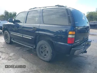 2005 Chevrolet Tahoe LT with VIN 1GNEC13T15R213638, listed as a IAAI auction lot 41787524 with 153,709 mi miles and . Bid and sale history available at DreamBid. Image 3.