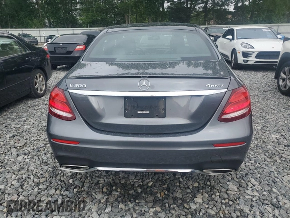2019 Mercedes-Benz E 300 with VIN WDDZF4KB7KA553856, listed as a Copart auction lot 61025735 with 59,001 mi miles and Salvage title. Bid and sale history available at DreamBid. Image 6.