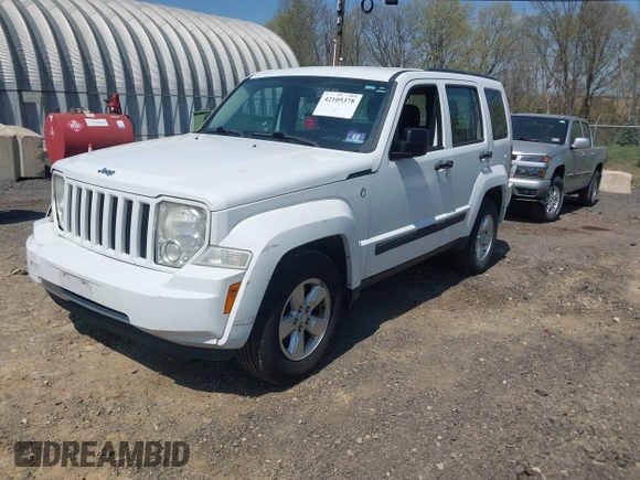2012 Jeep Liberty Sport z VIN 1C4PJMAK7CW209305, wystawiony jako IAAI lot #42105378 z przebiegiem 136 617 mil mil oraz . Historia ofert i sprzedaży dostępna na DreamBid. Obrazek 17.