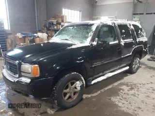 1999 Cadillac Escalade z VIN 1GYEK13R6XR404534, wystawiony jako IAAI lot #41391379 z przebiegiem 127 612 mil mil oraz . Historia ofert i sprzedaży dostępna na DreamBid. Obrazek 2.
