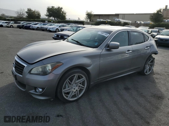 2011 Infiniti M with VIN JN1BY1APXBM322226, listed as a Copart auction lot 79061164 with 242,410 mi miles and Salvage Title. Bid and sale history available at carsss.com. Image 1.