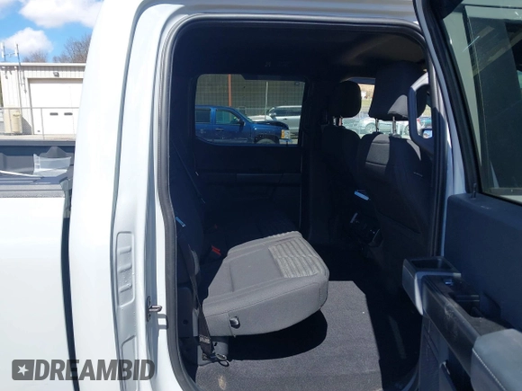 2023 Ford F-150 XL with VIN 1FTFW1E51PFB15197, listed as a IAAI auction lot 41869063 with 33,980 mi miles and . Bid and sale history available at DreamBid. Image 8.