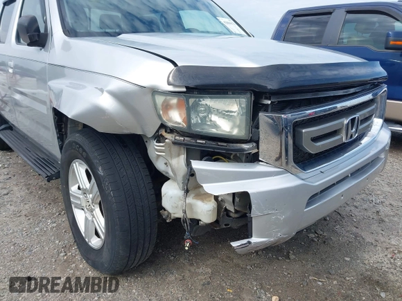 2009 Honda Ridgeline RTL with VIN 2HJYK16539H500986, listed as a IAAI auction lot 42084176 with 161,142 mi miles and . Bid and sale history available at DreamBid. Image 6.
