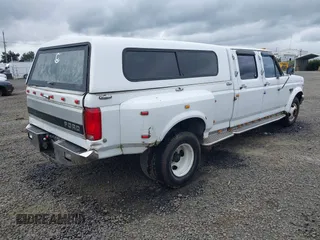 1995 Ford F-350 z VIN 1FTJW35G2SEA08715, wystawiony jako IAAI lot #41997319 z przebiegiem 204 657 mil mil oraz . Historia ofert i sprzedaży dostępna na DreamBid. Obrazek 4.