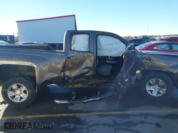 2014 Chevrolet Silverado 1500 LT with VIN 1GCRCREH5EZ165367, listed as a IAAI auction lot 41076729 with 130,425 mi miles and . Bid and sale history available at DreamBid. Image 13.