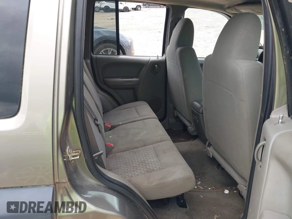 2005 Jeep Liberty Sport with VIN 1J4GL48K65W531365, listed as a IAAI auction lot 42004136 with 160,756 mi miles. Bid and sale history available at carsss.com. Image 8.