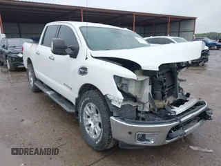 2017 Nissan Titan SV z VIN 1N6AA1E63HN537588, wystawiony jako IAAI lot #41953111 z przebiegiem 71 614 mil mil oraz . Historia ofert i sprzedaży dostępna na DreamBid. Obrazek 1.