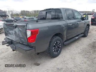 2017 Nissan Titan Platinum Reserve z VIN 1N6AA1E5XHN530256, wystawiony jako IAAI lot #42031654 z przebiegiem 97 200 mil mil oraz . Historia ofert i sprzedaży dostępna na DreamBid. Obrazek 4.