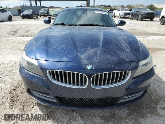 2009 BMW Z4 sDrive35i with VIN WBALM73549E164950, listed as a Copart auction lot 51116685 with 68,801 mi miles and Salvage title. Bid and sale history available at DreamBid. Image 5.