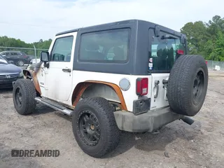 2012 Jeep Wrangler Sport with VIN 1C4AJWAG4CL214606, listed as a IAAI auction lot 42054857 with Not provided miles and . Bid and sale history available at DreamBid. Image 3.