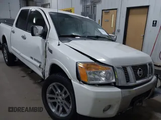 2014 Nissan Titan S with VIN 1N6AA0EC1EN504617, listed as a IAAI auction lot 41633861 with 65,047 mi miles. Bid and sale history available at carsss.com. Image 1.