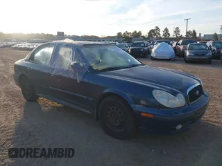 2003 Hyundai Sonata with VIN KMHWF25S93A887316, listed as a IAAI auction lot 41714217 with 299,890 mi miles. Bid and sale history available at carsss.com. Image 1.