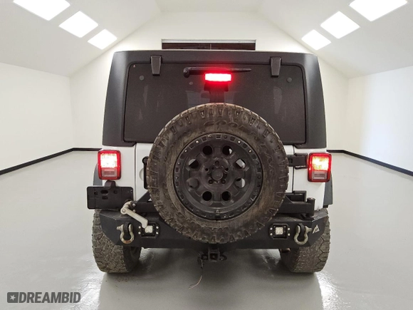 2017 Jeep Wrangler Unlimited Rubicon with VIN 1C4BJWFG9HL541037, listed as a Copart auction lot 47129265 with 67,353 mi miles and Clean Title. Bid and sale history available at carsss.com. Image 6.