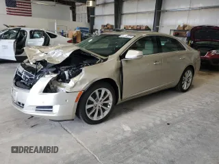 2014 Cadillac XTS Luxury z VIN 2G61M5S34E9173338, wystawiony jako Copart lot #54136575 z przebiegiem 134 119 mil mil oraz Szkody całkowita. Historia ofert i sprzedaży dostępna na DreamBid. Obrazek 1.