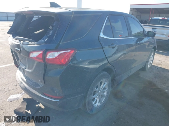 2021 Chevrolet Equinox LT with VIN 2GNAXKEV8M6126238, listed as a IAAI auction lot 42008365 with 89,576 mi miles and . Bid and sale history available at DreamBid. Image 4.