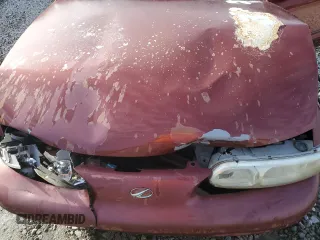 2002 Oldsmobile Alero GL1 z VIN 1G3NL52F92C221691, wystawiony jako Copart lot #88012125 z przebiegiem 249 598 mil mil oraz Szkoda całkowita • Salvage title. Historia ofert i sprzedaży dostępna na DreamBid. Obrazek 11.