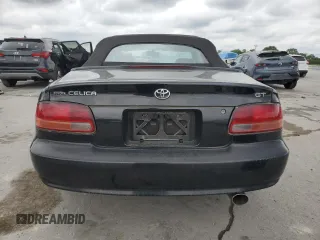 1996 Toyota Celica GT z VIN JT5FG02T3T0031613, wystawiony jako Copart lot #58410225 z przebiegiem 124 899 mil mil oraz Szkoda całkowita • Salvage title. Historia ofert i sprzedaży dostępna na DreamBid. Obrazek 6.