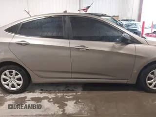 2013 Hyundai Accent GLS with VIN KMHCT4AE2DU486097, listed as a IAAI auction lot 41972806 with 295,949 mi miles. Bid and sale history available at carsss.com. Image 14.