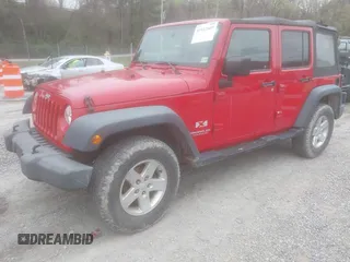 2008 Jeep Wrangler Unlimited X with VIN 1J8GA39128L562347, listed as a IAAI auction lot 41912669 with 106,040 mi miles and . Bid and sale history available at carsss.com. Image 18.