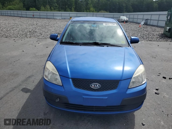 2009 Kia Rio LX with VIN KNADE223696530633, listed as a Copart auction lot 68371794 with 165,505 mi miles and Salvage Title. Bid and sale history available at DreamBid. Image 5.