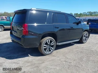 2020 Chevrolet Tahoe LT with VIN 1GNSCBKC3LR133202, listed as a IAAI auction lot 41798293 with 81,469 mi miles. Bid and sale history available at carsss.com. Image 4.