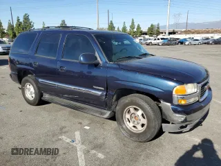 2004 GMC Yukon SLE with VIN 1GKEC13V84R179274, listed as a Copart auction lot 77367204 with 309,239 mi miles and Salvage Title. Bid and sale history available at carsss.com. Image 4.