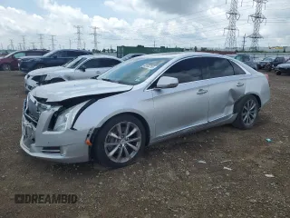 2013 Cadillac XTS Luxury with VIN 2G61P5S39D9100178, listed as a Copart auction lot 62160795 with 216,670 mi miles and Salvage title. Bid and sale history available at DreamBid. Image 1.