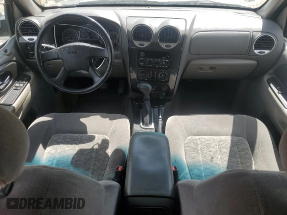 2002 GMC Envoy SLT z VIN 1GKDS13S722253150, wystawiony jako Copart lot #56255185 z przebiegiem 174 198 mil mil oraz Szkoda całkowita • Salvage title. Historia ofert i sprzedaży dostępna na DreamBid. Obrazek 8.