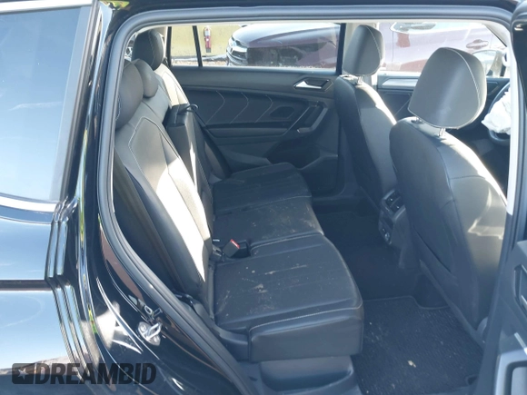 2023 Volkswagen Tiguan SE with VIN 3VVMB7AX8PM032557, listed as a IAAI auction lot 41585975 with 28,706 mi miles and . Bid and sale history available at DreamBid. Image 8.