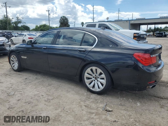2011 BMW 7 Series with VIN WBAKX8C57BC198326, listed as a Copart auction lot 69985174 with 142,353 mi miles and Clean title. Bid and sale history available at DreamBid. Image 2.