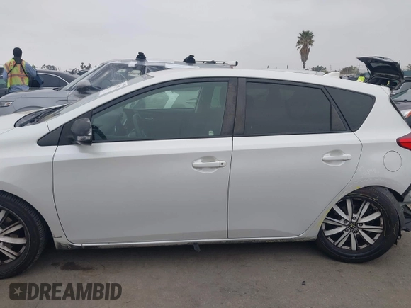 2016 Scion iM with VIN JTNKARJE1GJ516789, listed as a IAAI auction lot 42034498 with 132,796 mi miles. Bid and sale history available at carsss.com. Image 15.