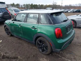 2022 MINI Hardtop 4 Door Cooper S with VIN WMW53DK07N2S44464, listed as a IAAI auction lot 41635613 with 28,303 mi miles. Bid and sale history available at carsss.com. Image 3.