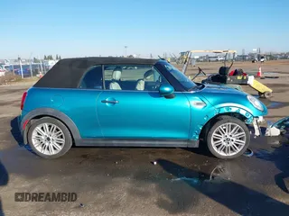 2016 MINI Convertible z VIN WMWWG5C50G3C19656, wystawiony jako IAAI lot #41429611 z przebiegiem 60 873 mil mil oraz . Historia ofert i sprzedaży dostępna na DreamBid. Obrazek 14.