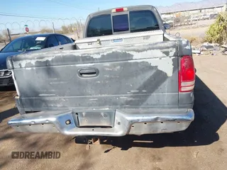 1997 Dodge Dakota z VIN 1B7GL23Y0VS153508, wystawiony jako IAAI lot #41610079 z przebiegiem 266 645 mil mil oraz . Historia ofert i sprzedaży dostępna na DreamBid. Obrazek 16.