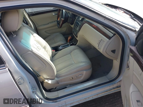 2010 Cadillac DTS w/1SC with VIN 1G6KD5EY2AU105662, listed as a IAAI auction lot 41739669 with 126,335 mi miles. Bid and sale history available at carsss.com. Image 5.