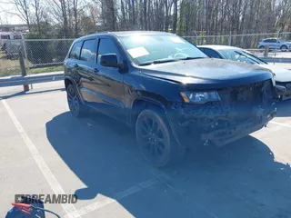 2017 Jeep Grand Cherokee Altitude with VIN 1C4RJEAG2HC880691, listed as a IAAI auction lot 41892221 with 116,008 mi miles and . Bid and sale history available at DreamBid. Image 1.