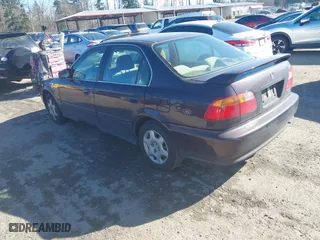2000 Honda Civic EX with VIN 1HGEJ8649YL034008, listed as a IAAI auction lot 41691792 with 196,593 mi miles. Bid and sale history available at carsss.com. Image 3.