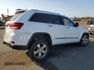 2013 Jeep Grand Cherokee Overland with VIN 1C4RJFCG8DC639408, listed as a Copart auction lot 77910444 with 89,623 mi miles and Salvage Title. Bid and sale history available at carsss.com. Image 3.