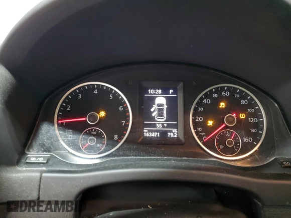 2013 Volkswagen Tiguan SE z VIN WVGBV3AX1DW579506, wystawiony jako Copart lot #52719575 z przebiegiem 163 471 mil mil oraz Szkoda całkowita • Salvage title. Historia ofert i sprzedaży dostępna na DreamBid. Obrazek 9.