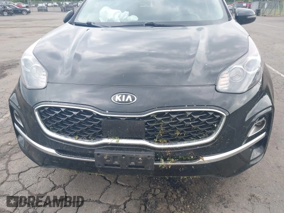 2021 Kia Sportage EX with VIN KNDPNCAC5M7848673, listed as a IAAI auction lot 42373684 with 108,409 mi miles and . Bid and sale history available at DreamBid. Image 6.
