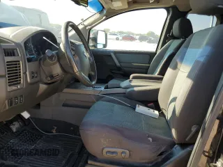 2006 Nissan Titan SE with VIN 1N6BA06B96N521452, listed as a Copart auction lot 70101084 with 197,101 mi miles and Salvage Title. Bid and sale history available at DreamBid. Image 7.