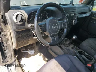2017 Jeep Wrangler Rubicon with VIN 1C4BJWCG0HL675472, listed as a Copart auction lot 62751365 with 86,338 mi miles and Salvage title. Bid and sale history available at DreamBid. Image 8.
