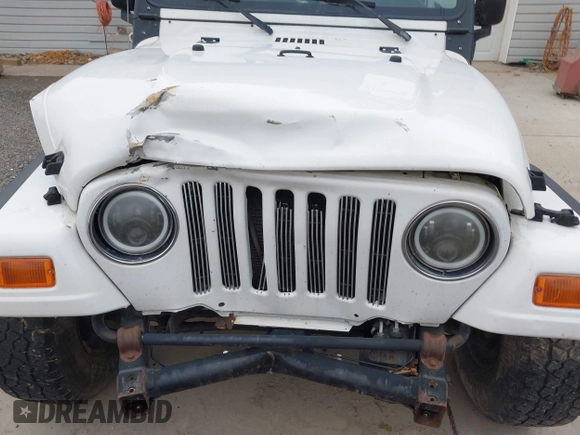 2005 Jeep Wrangler Sport with VIN 1J4FA49S25P352170, listed as a IAAI auction lot 41794958 with 154,304 mi miles. Bid and sale history available at carsss.com. Image 6.