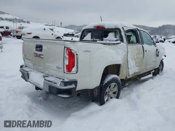 2016 GMC Canyon 4WD SLE with VIN 1GTG6CE39G1214362, listed as a IAAI auction lot 41278363 with 96,740 mi miles. Bid and sale history available at carsss.com. Image 4.