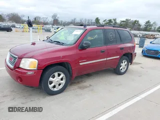 2006 GMC Envoy SLE with VIN 1GKDT13S262175296, listed as a IAAI auction lot 41866248 with 249,830 mi miles. Bid and sale history available at carsss.com. Image 2.