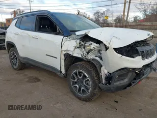 2024 Jeep Compass Trailhawk with VIN 3C4NJDDN7RT131393, listed as a IAAI auction lot 41217550 with 8,215 mi miles and . Bid and sale history available at DreamBid. Image 1.